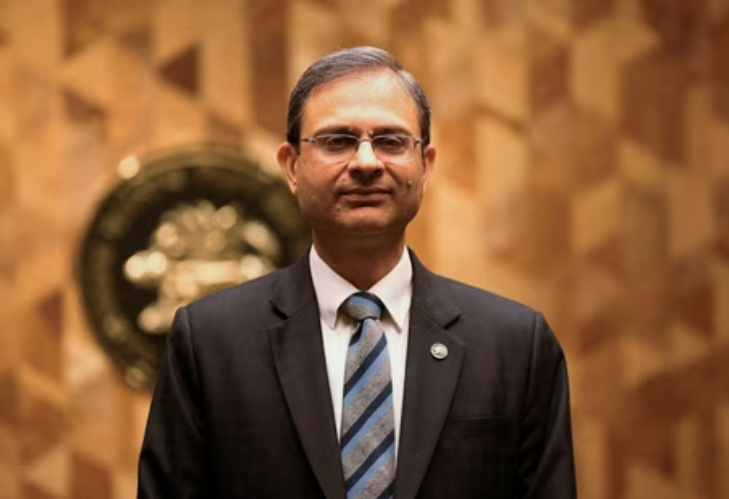 RBI Cuts Repo Rate to 5.25% as Rupee Slides