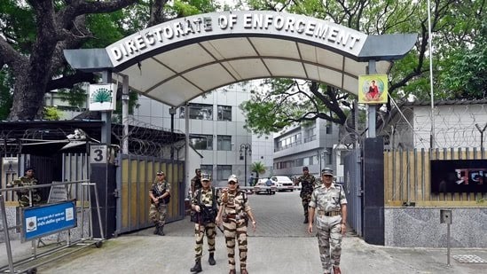 Luxury cars, cash seized in multi-city raids